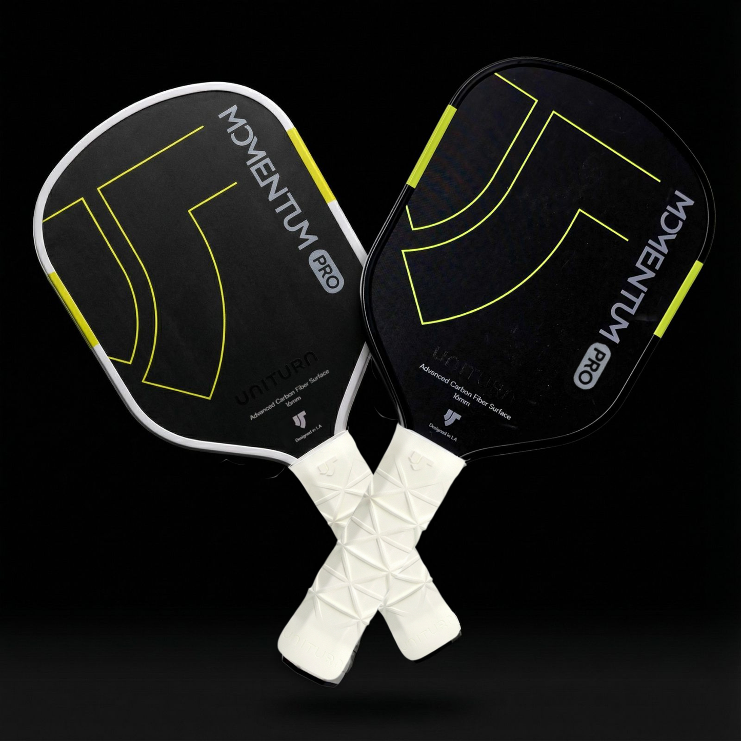Two pickleball paddles with 'Momentum Pro' branding on a black background